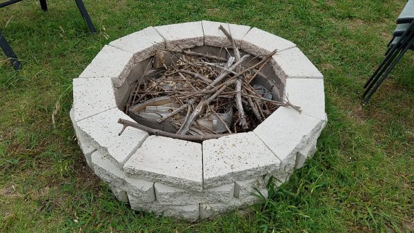 Build a fire pit in your backyard for summer evenings full of memories ... and survival skills!