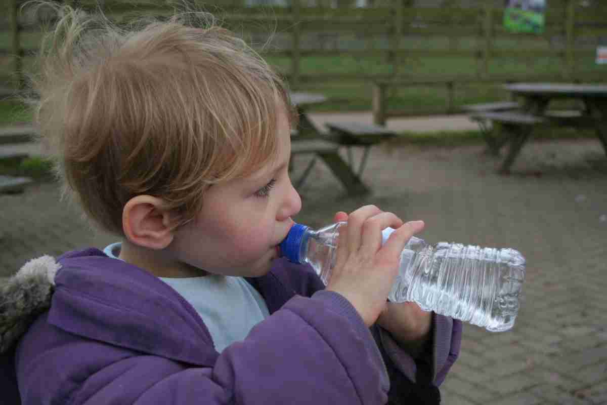 child drinking clean water