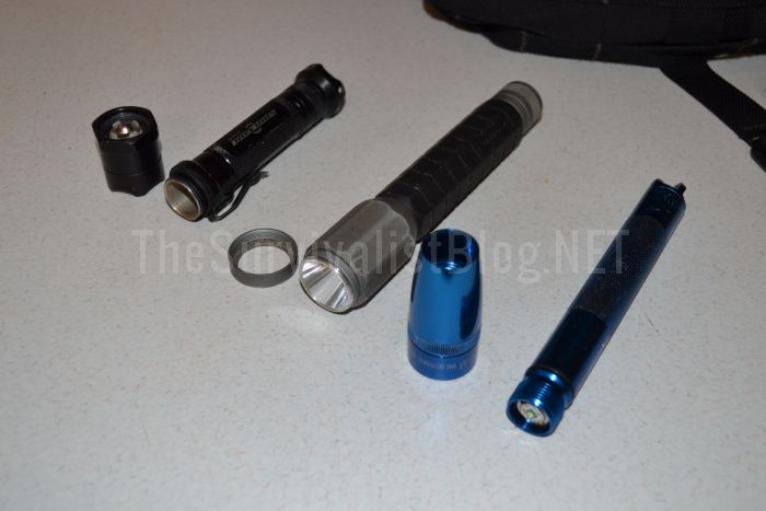 three maglite flashlights