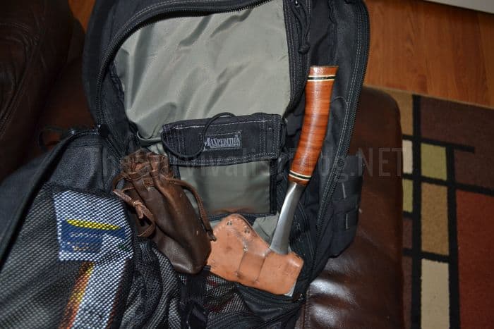 hatchet inside a survival bag