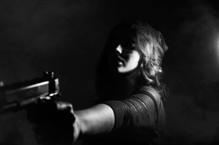 woman using gun to defend herself
