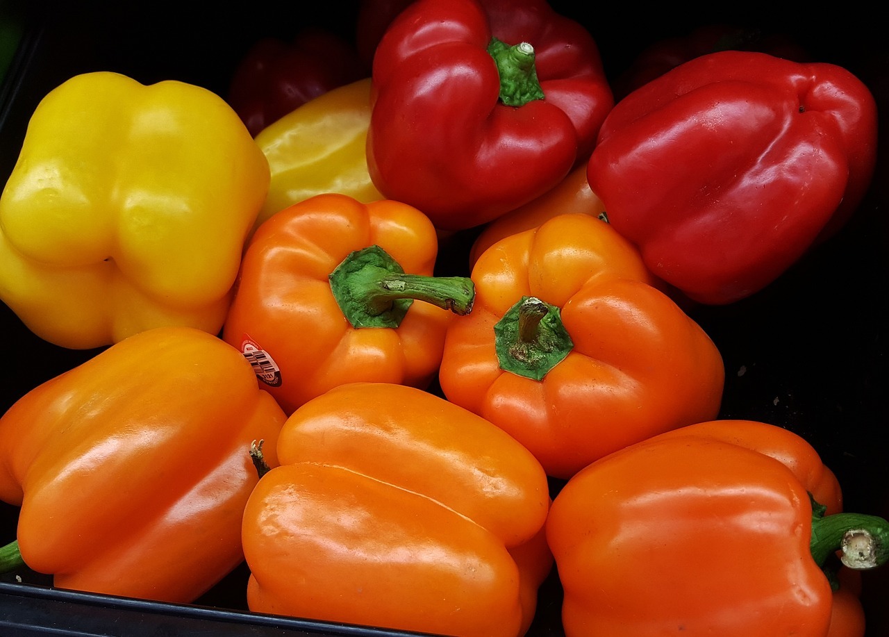 mixed yellow, orange and red bell peppers