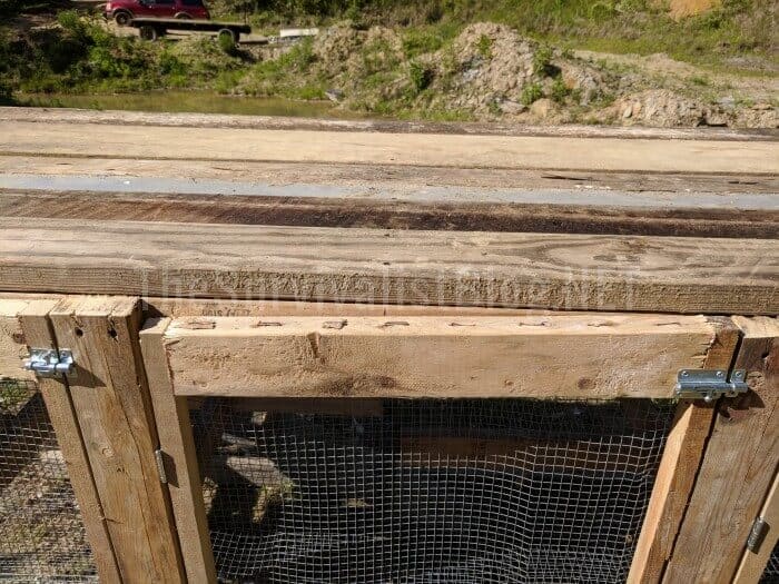 wood planks on top of chicken wire