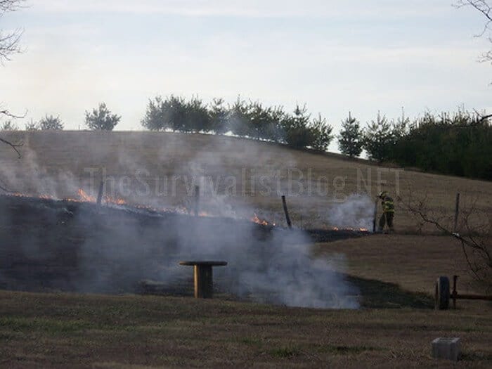 firefighter in action during a wildfire