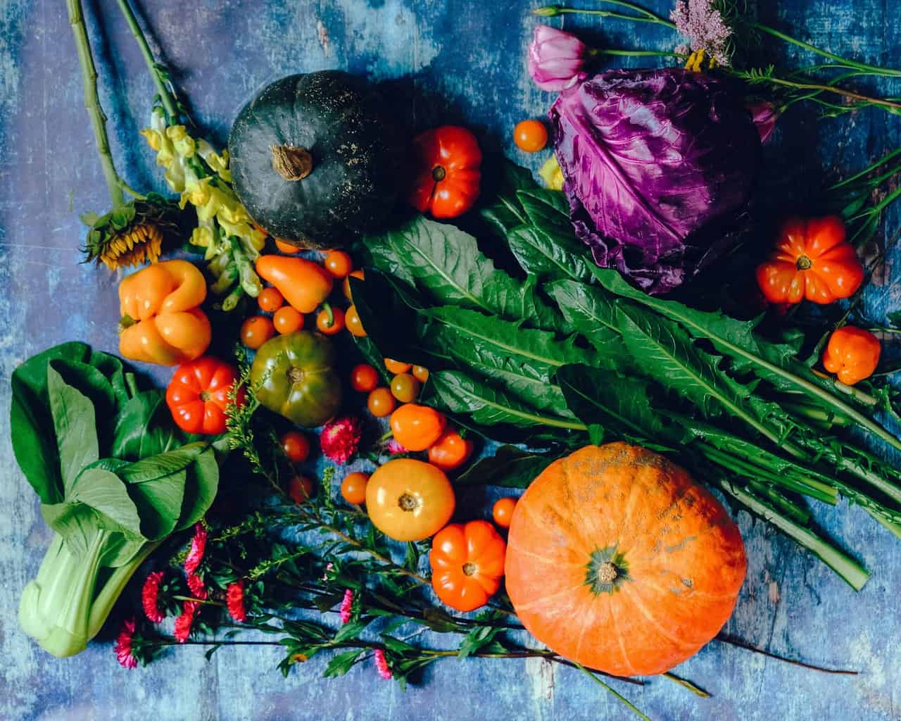 a display of various fall vegetables