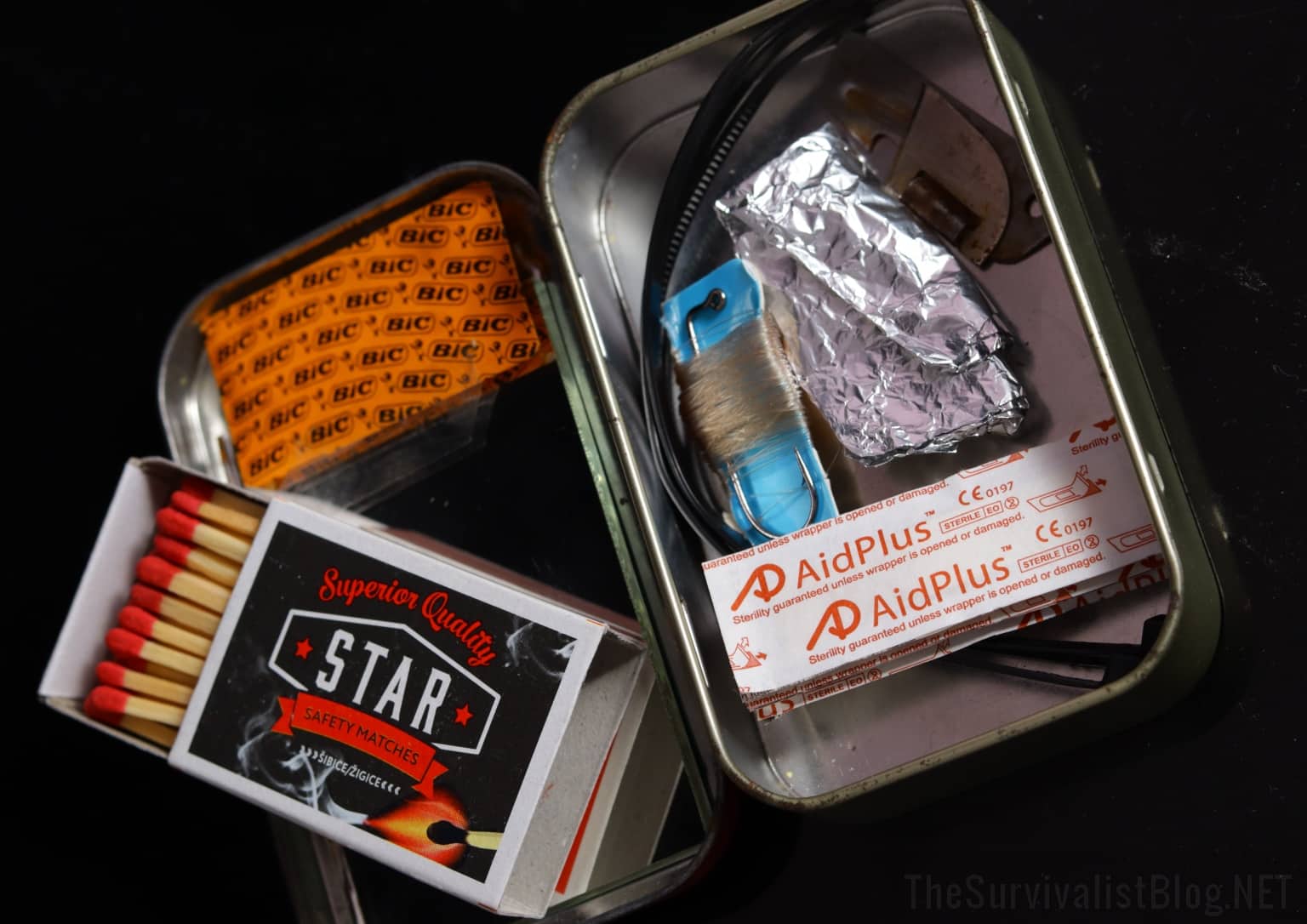 a mini survival kit inside an Altoids tin
