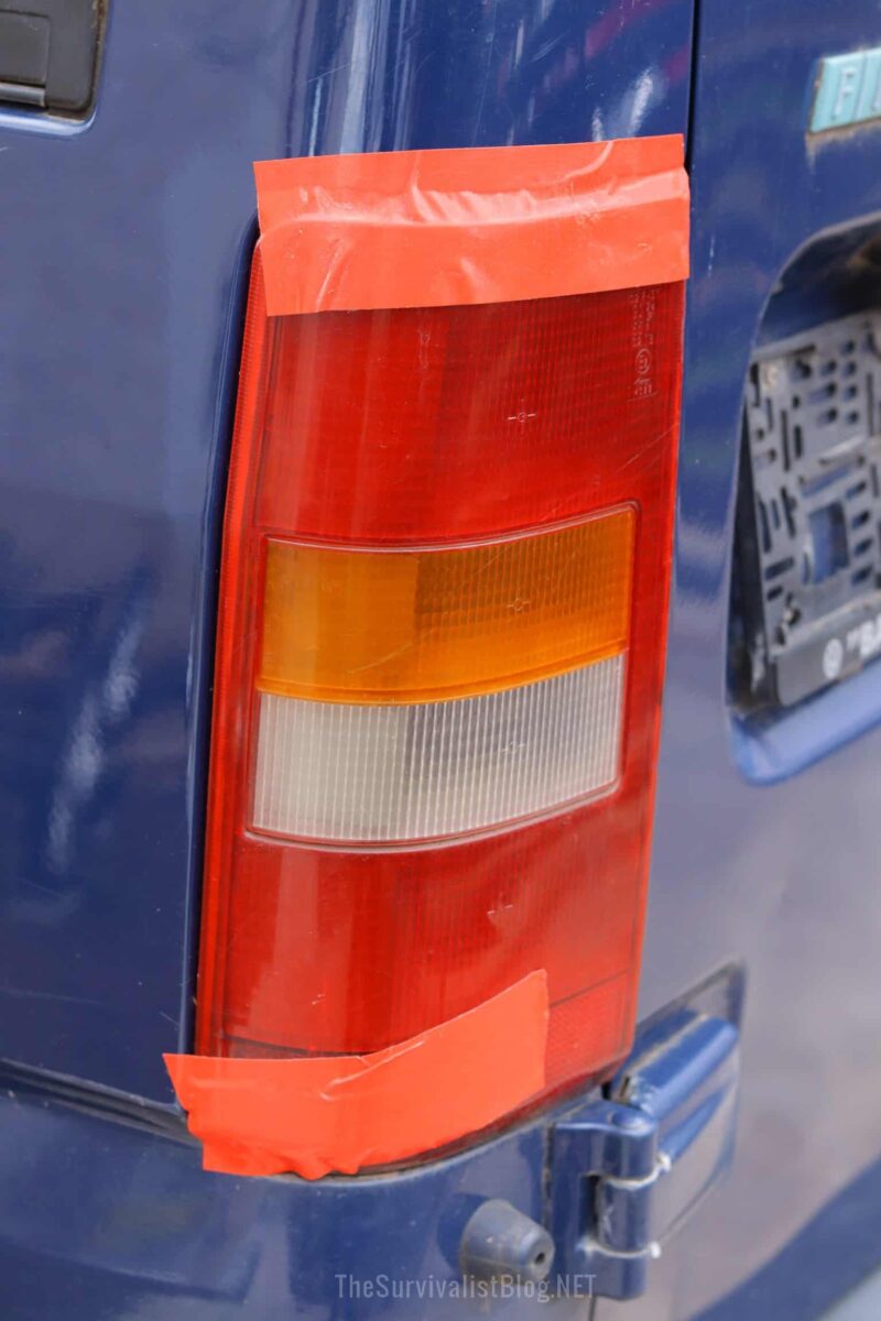 broken tail light patched with duct tape