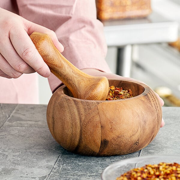 Using Wooden Mortar and Pestle