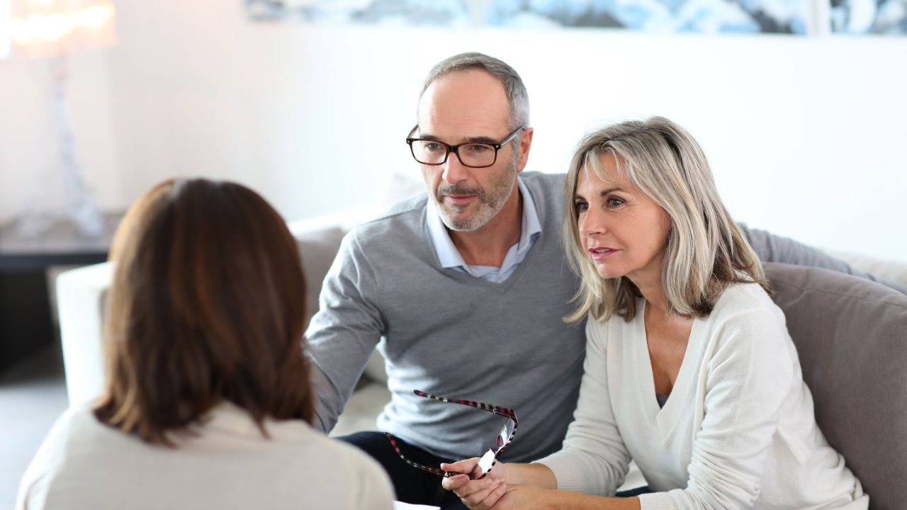 couple talking to a professional