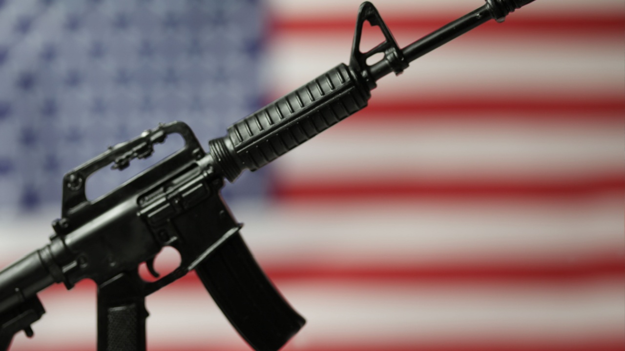 assault weapon on flag (