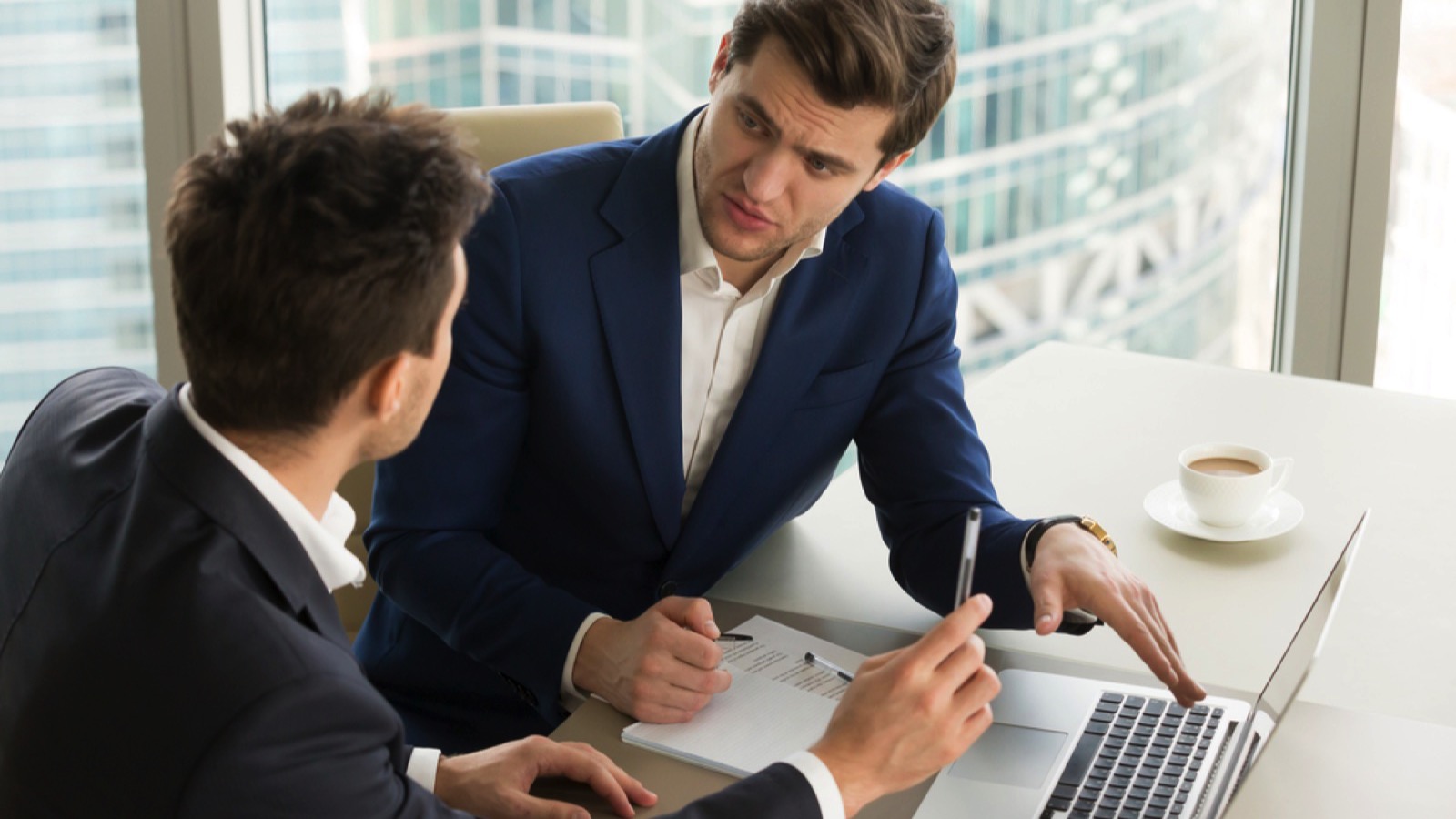 Businessman negotiating with client