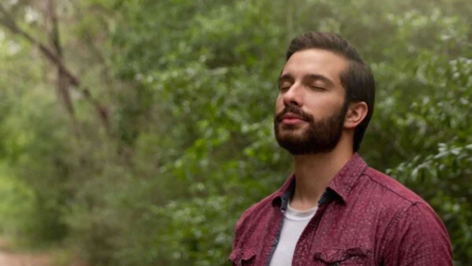 man breathing deeply and staying calm