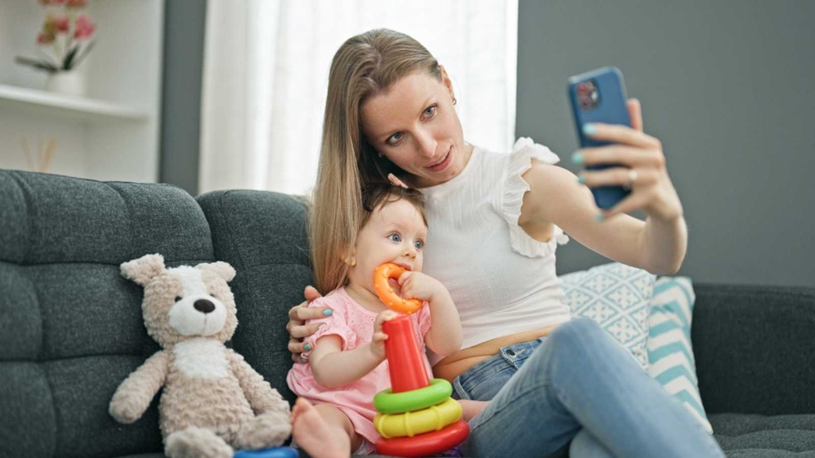 Mother taking selfie of kid