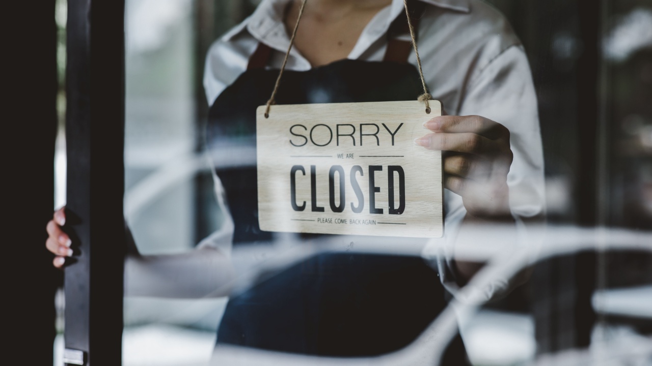 closed sign in show, business closure