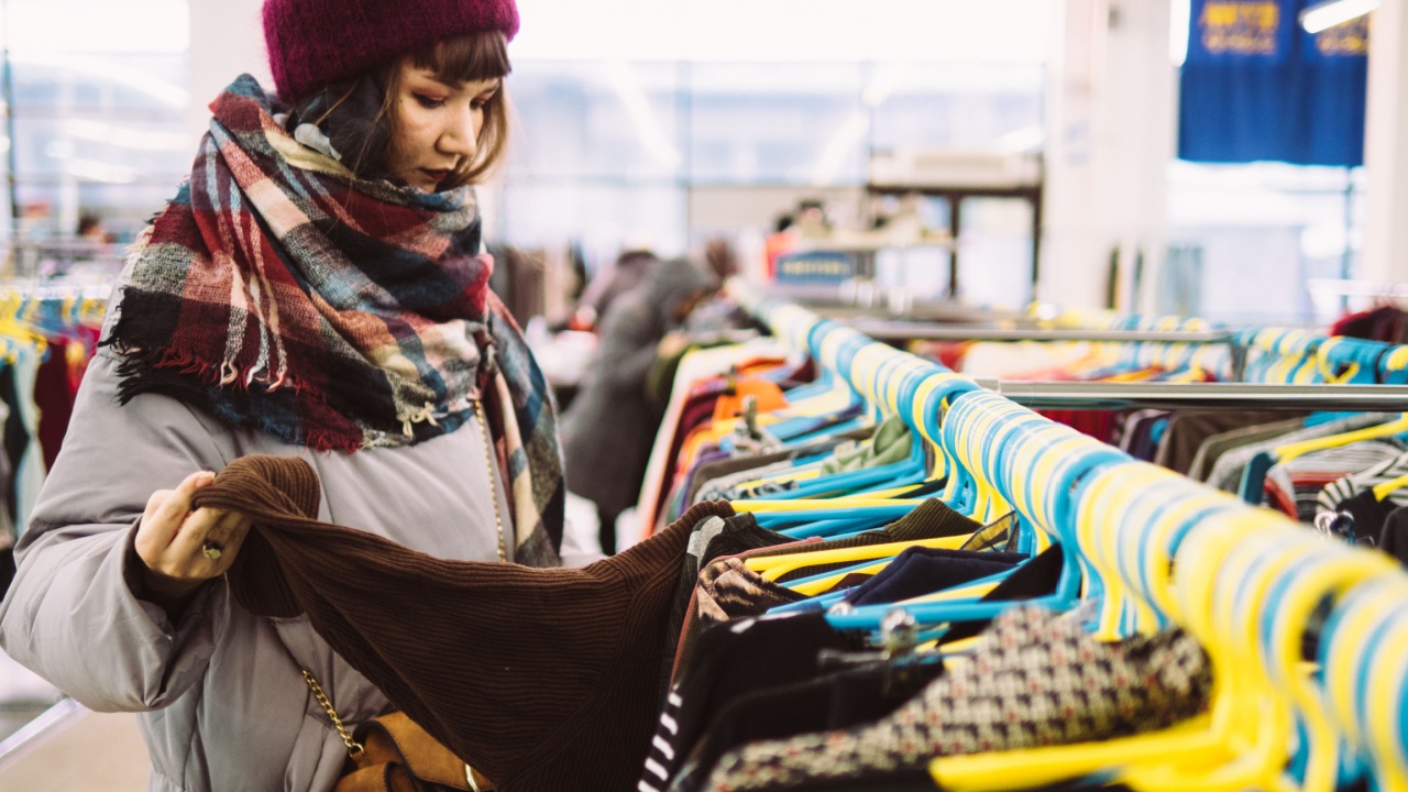 woman shopping in a thrift shop