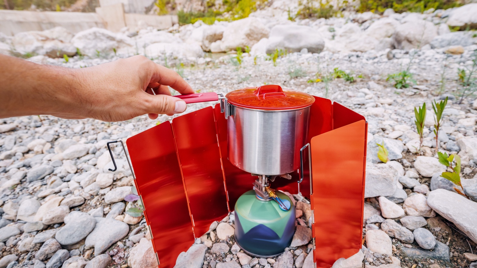 camping stove with wind screen shield. Cooking hiking food