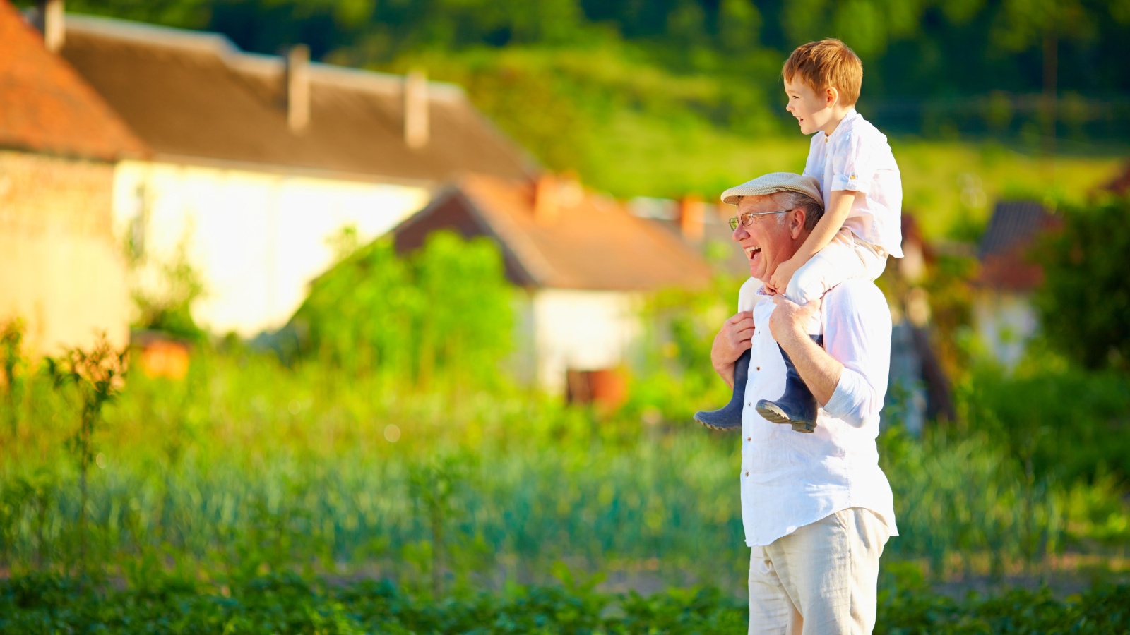 grandfather and grandson having fun on their homestead