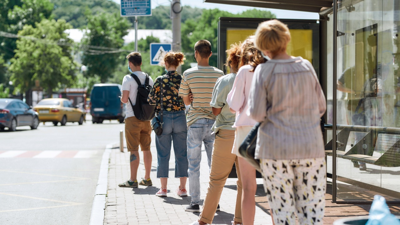 people waiting for a bus, service disruption