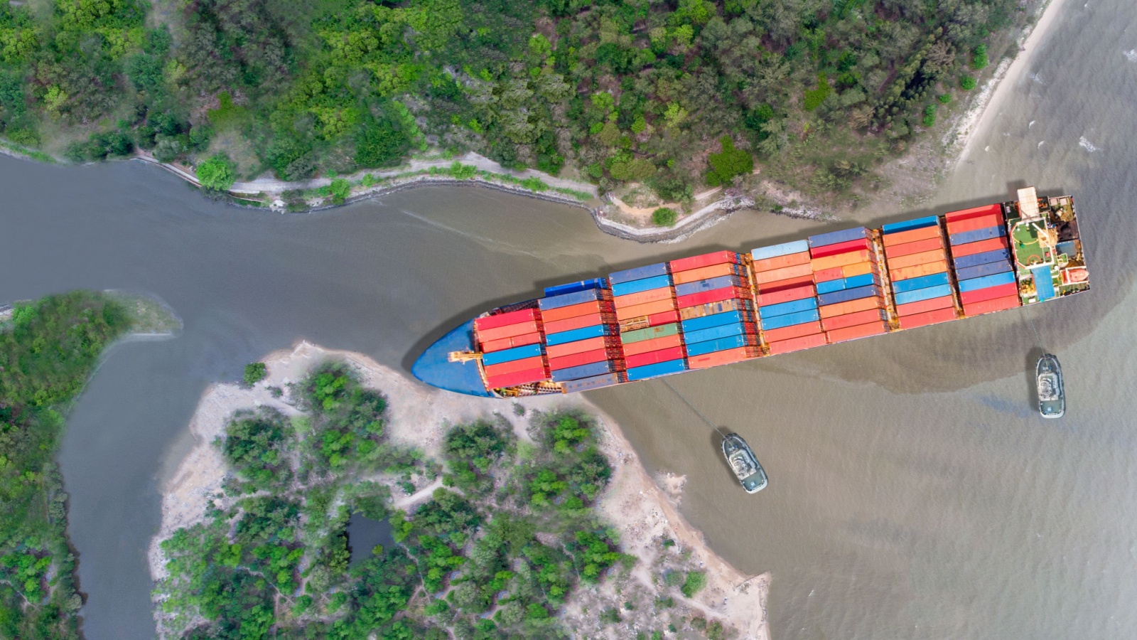 Canal blocked by huge cargo container ship