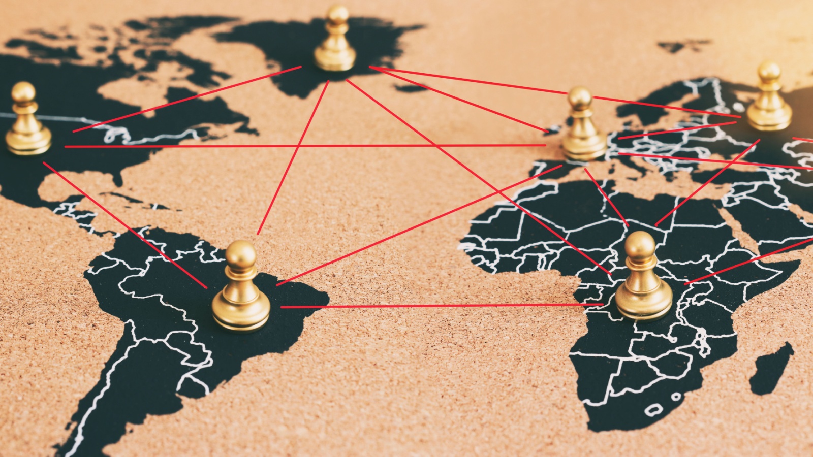 concept of geopolitics or worldwide economy. chess figures placed on map banner