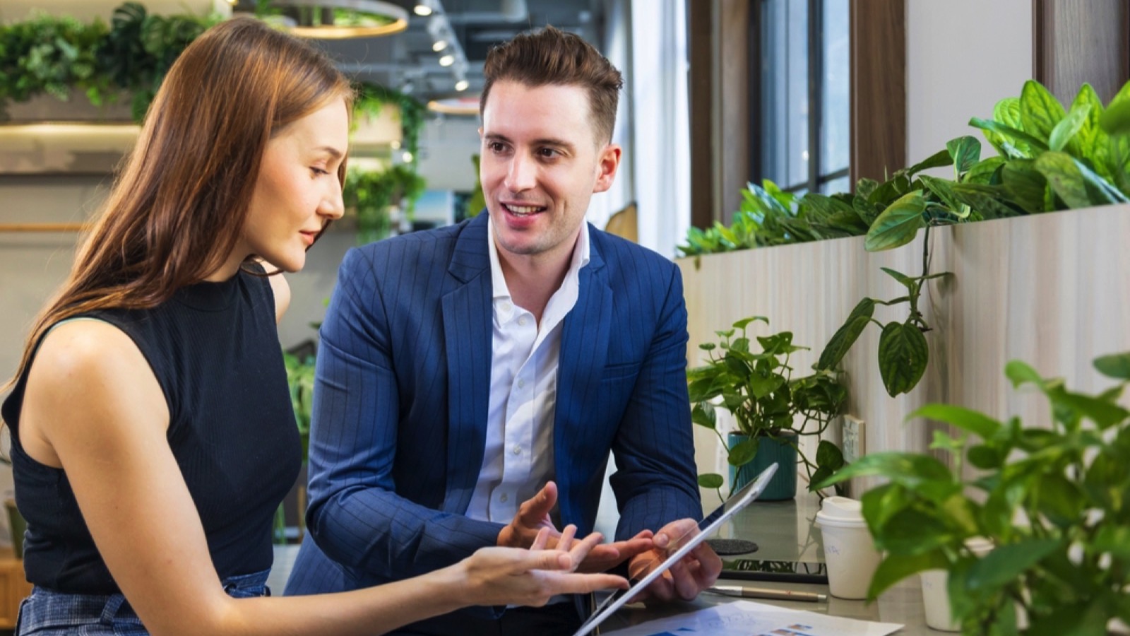 Businessman discussing with worker