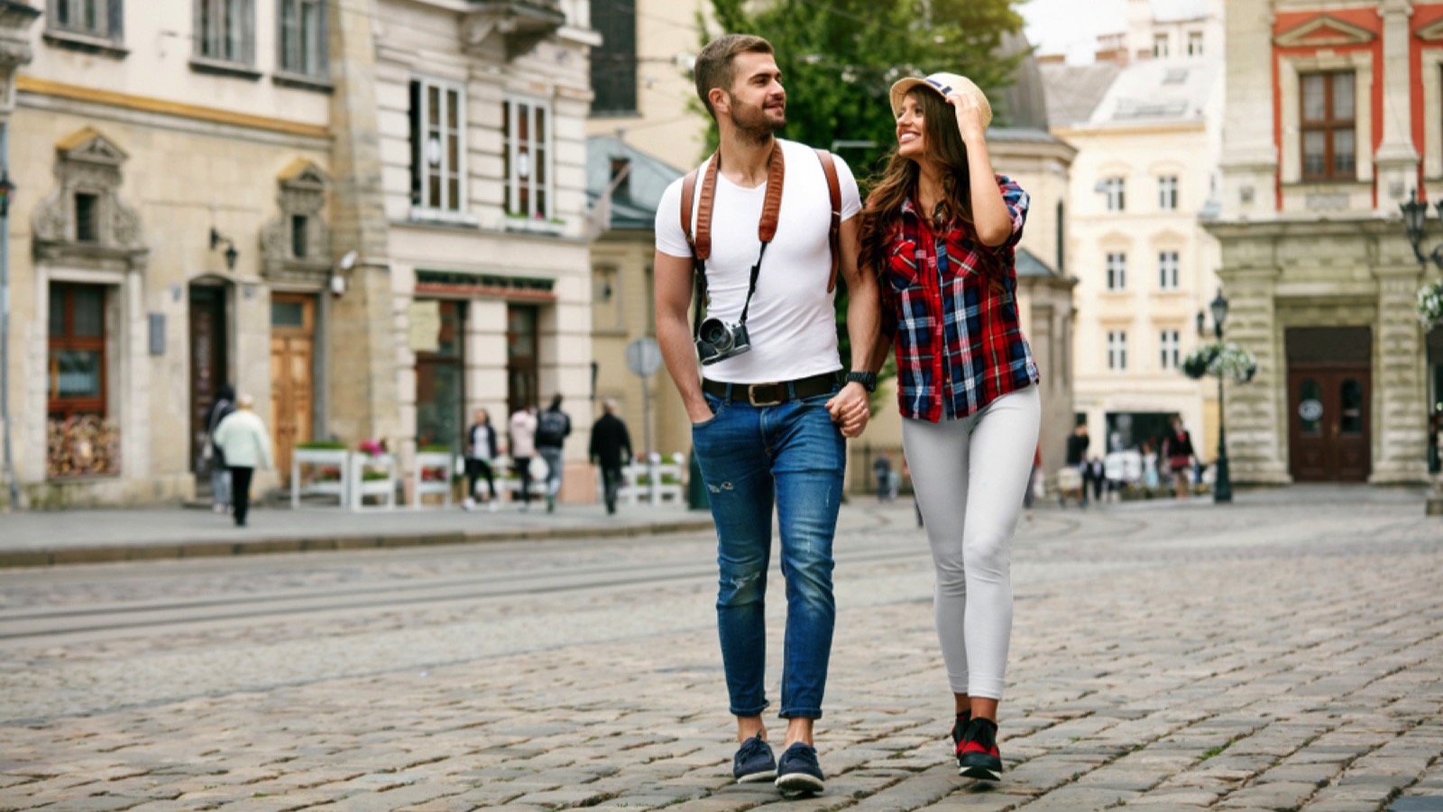 Couples walking through the city