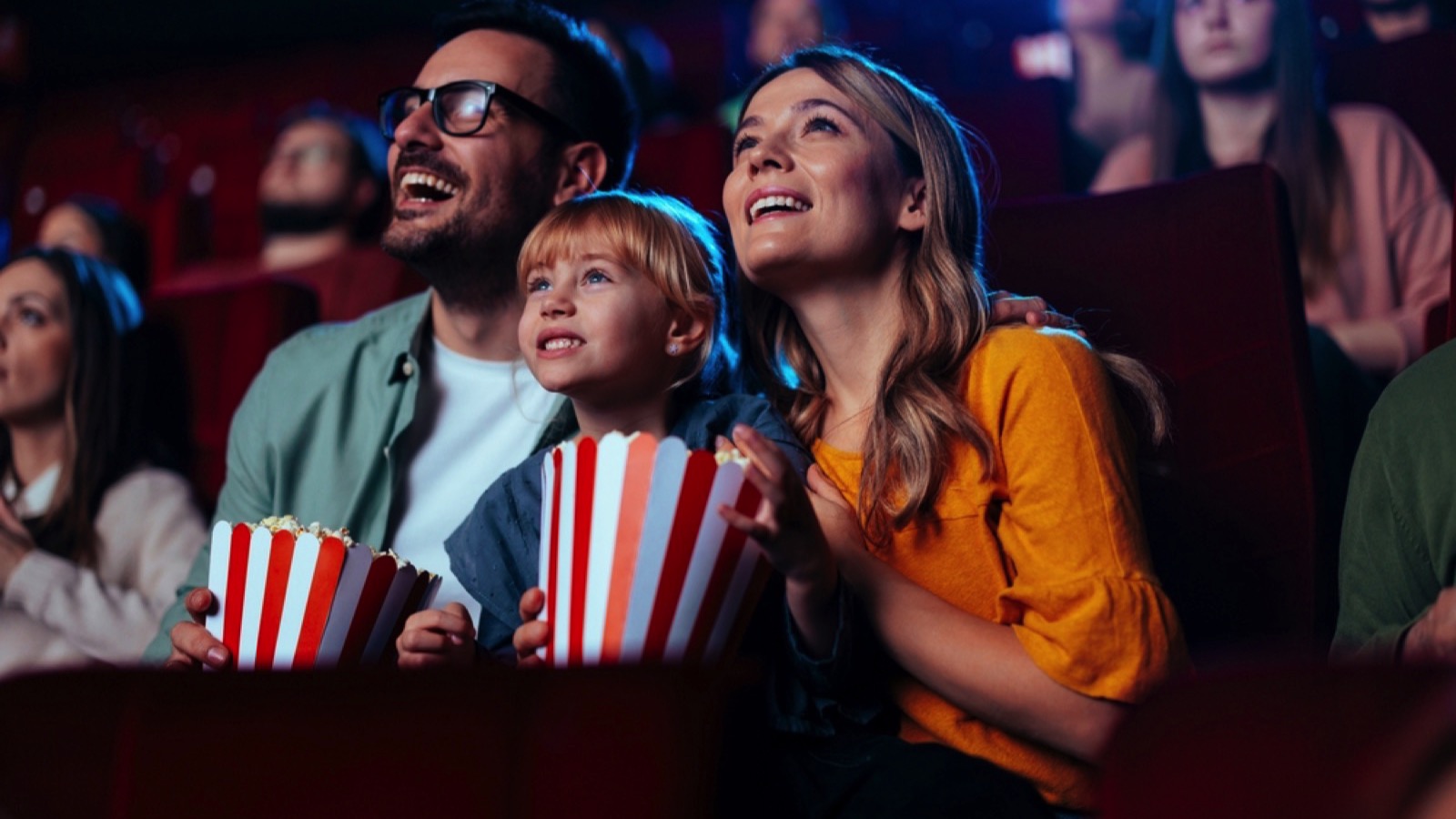 Couples watching movie in theatre