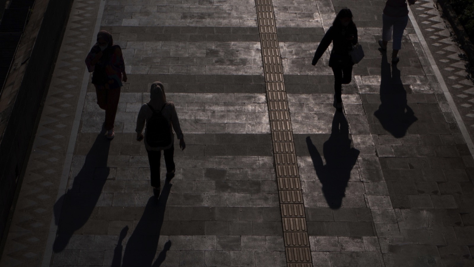 Group of people walking at night