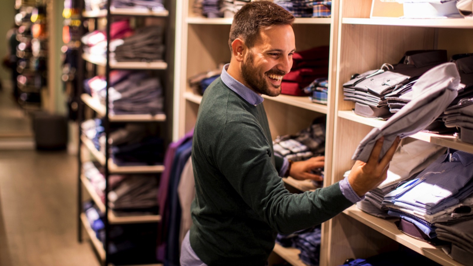 Man buying branded shirt