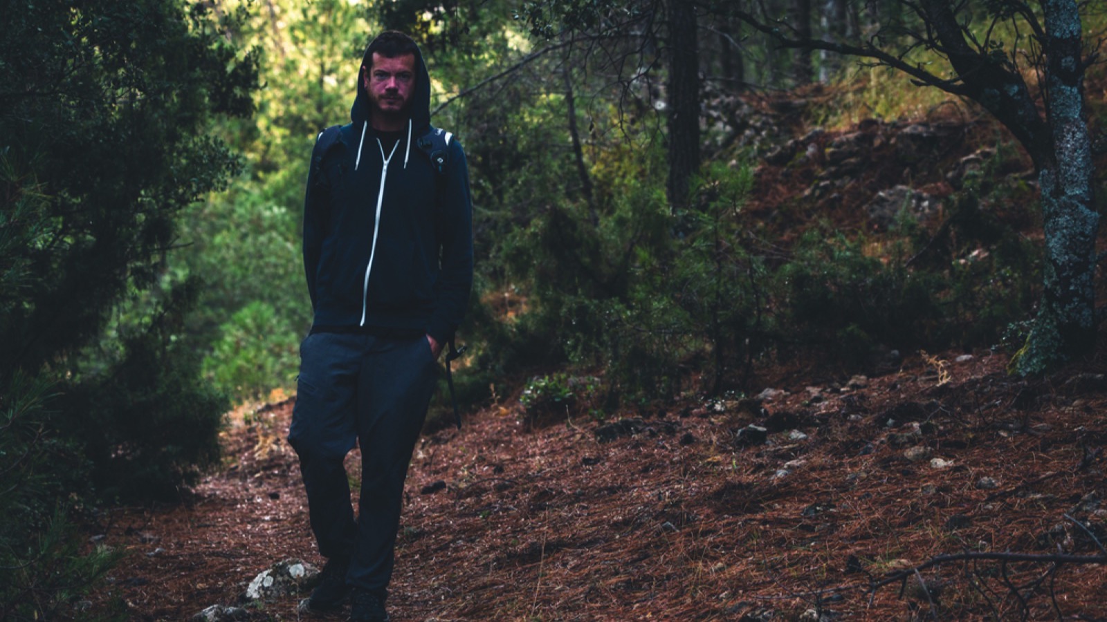 Man walking alone in forest