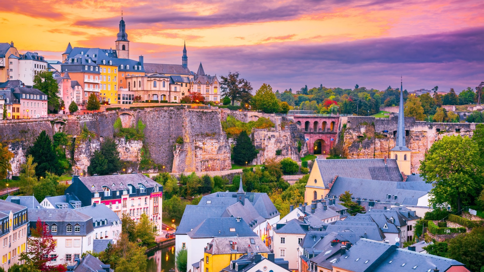 Luxembourg City, twilight scenic with old town, Alzette River, beautiful colored sky clouds.