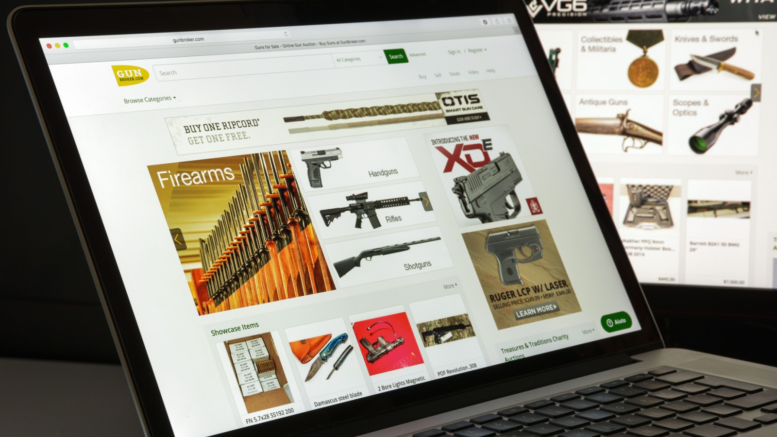 Gunbroker.com website homepage. It is an auction website specializing in the sale of firearms and related items. 