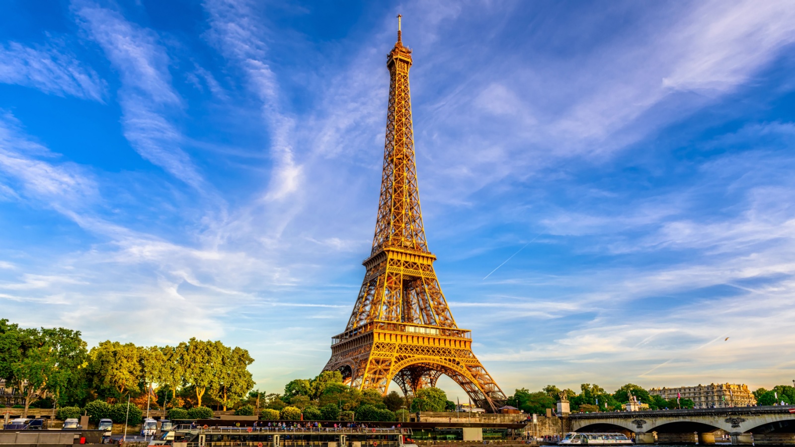 Paris Eiffel Tower and river Seine at sunset in Paris, France. Eiffel Tower is one of the most iconic landmarks of Paris.