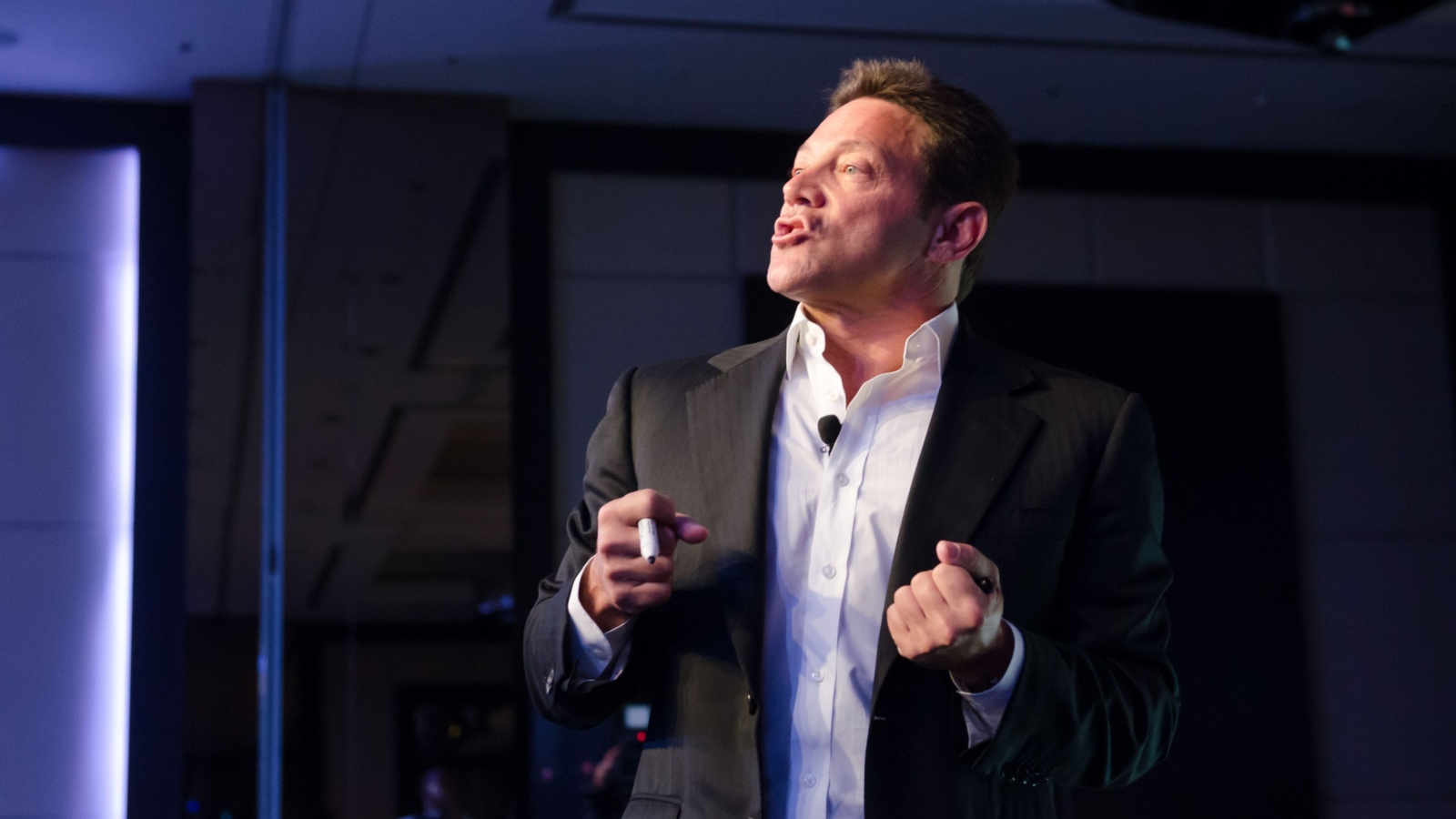 Jordan belfort the real wolf of wall street, holds a seminar to reveal his life, telling his story about stealing millions of dollars through the penny stock market.