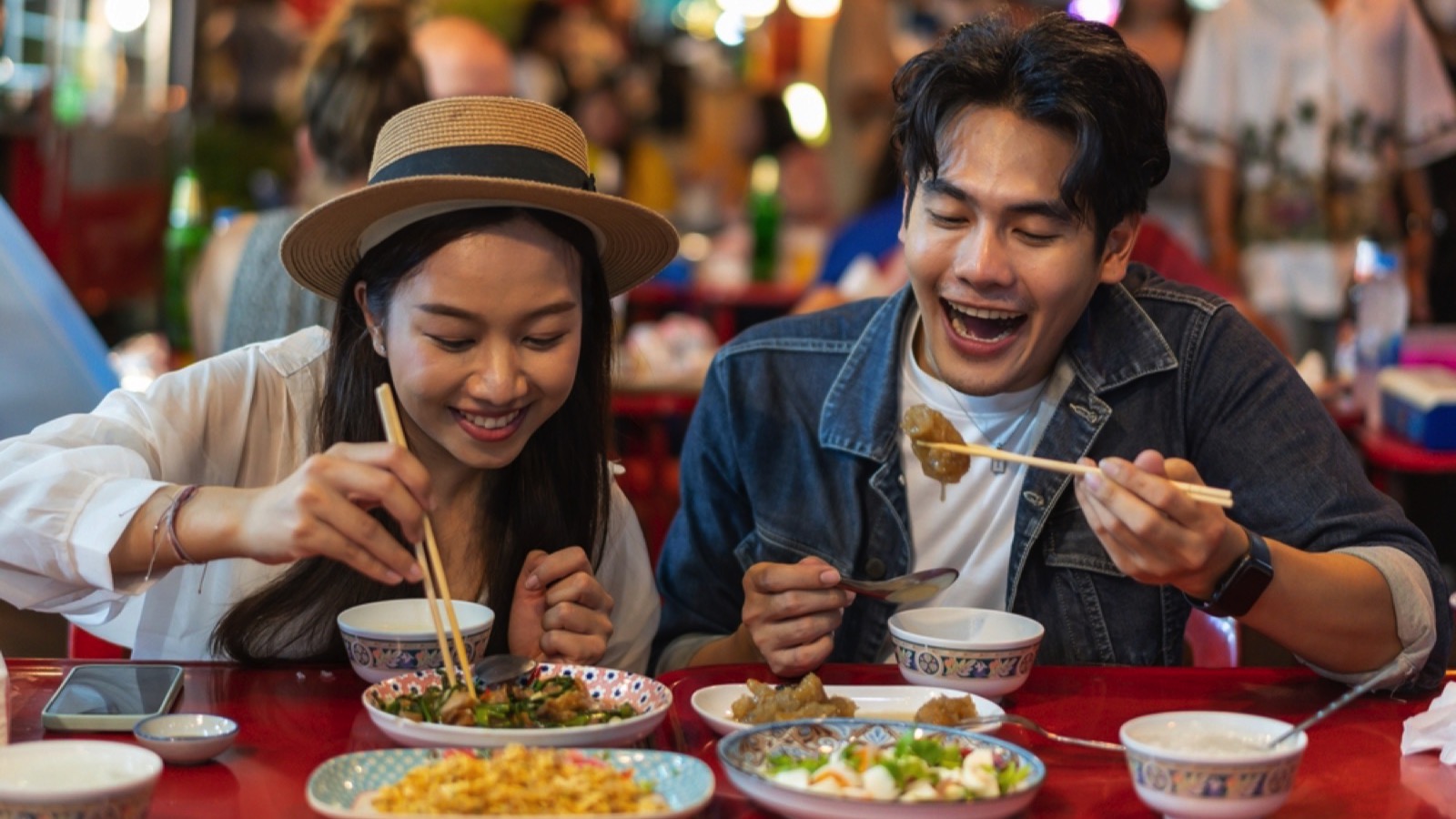 Tourist eating in market