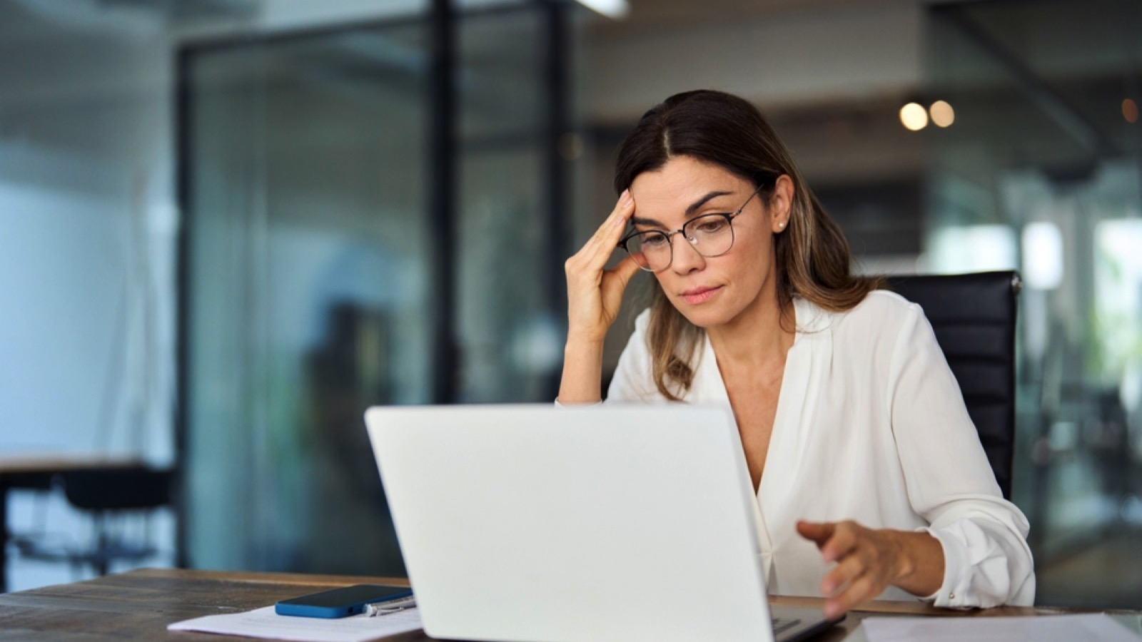 Woman being stressed in office