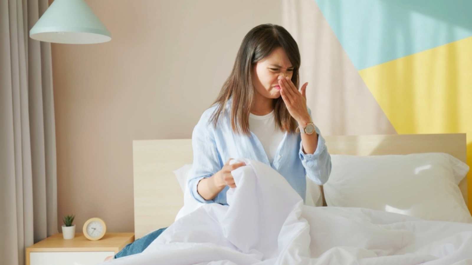 Woman in bad smelly bed