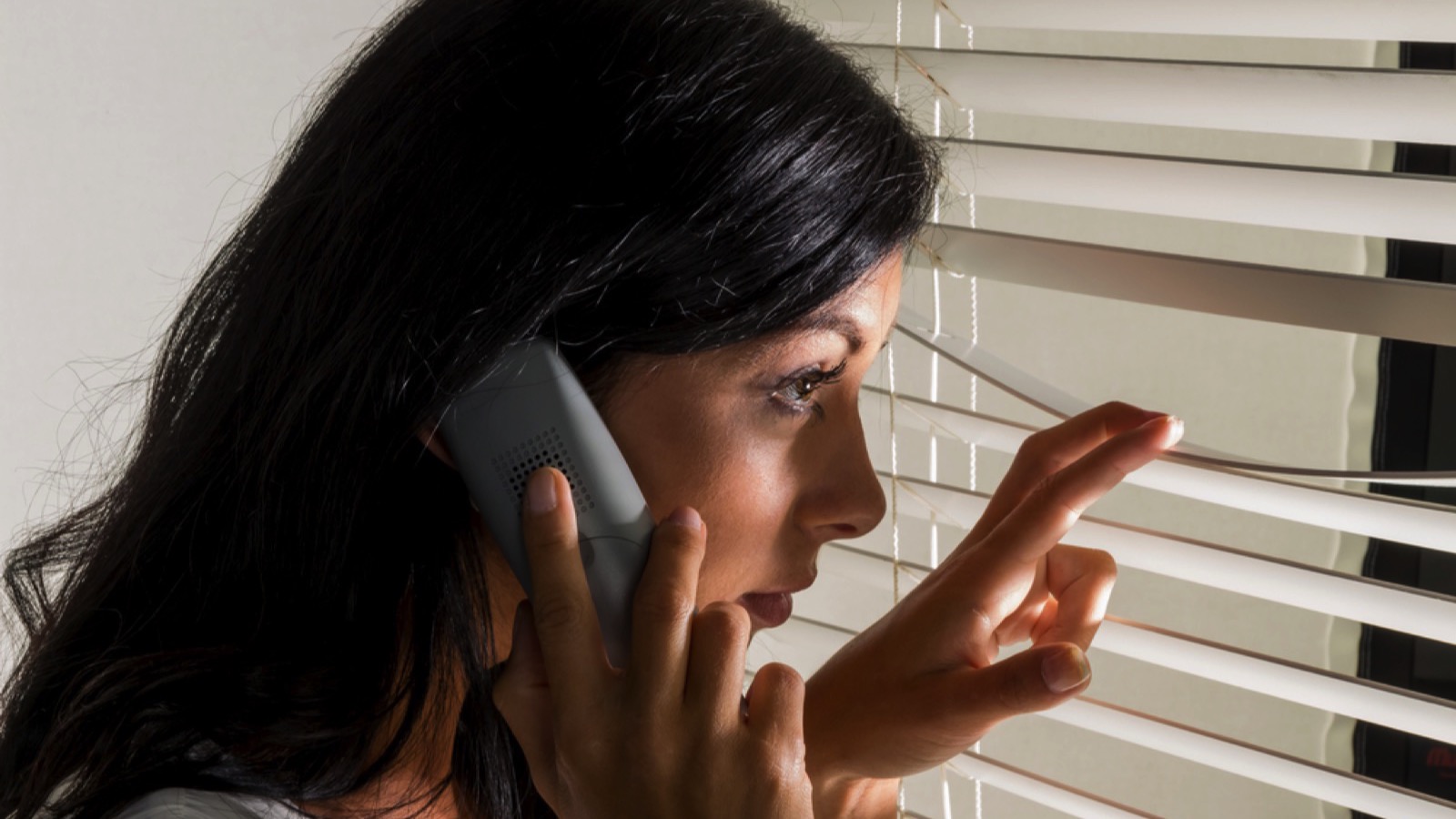 Woman watching neighborhood