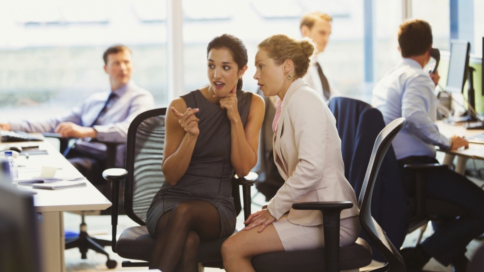 Women Gossiping in office