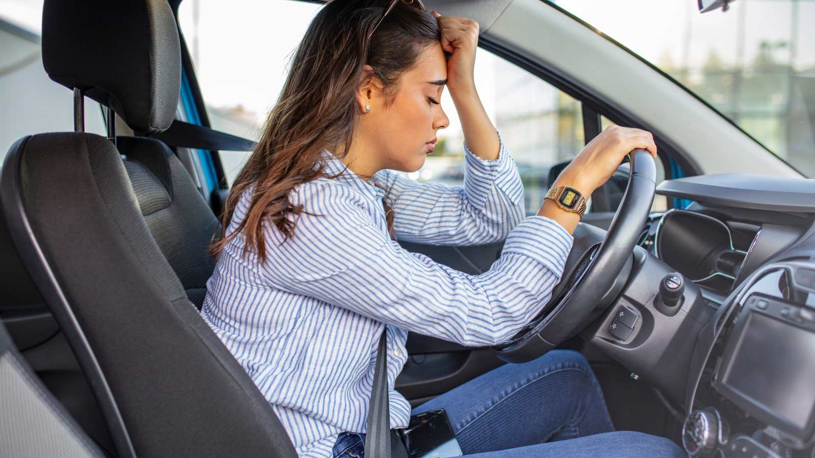 Woman pissed off in car